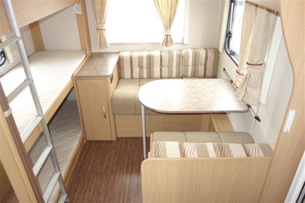 Elddis   Explore 506 triple bunkbeds   Year 2012  Berth 6 perfect family layout caravan  - Image 7