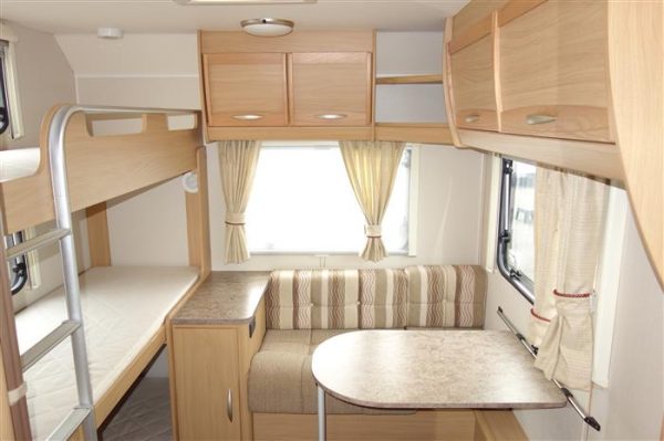 Elddis   Explore 506 triple bunkbeds   Year 2012  Berth 6 perfect family layout caravan  - Image 8