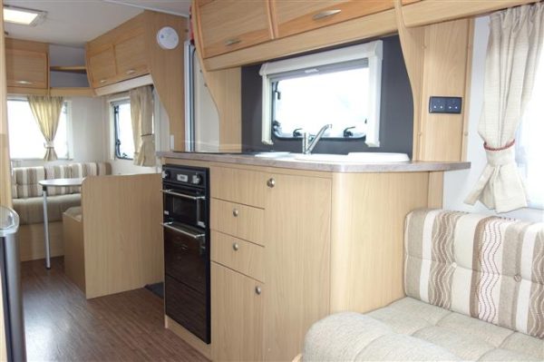 Elddis   Explore 506 triple bunkbeds   Year 2012  Berth 6 perfect family layout caravan  - Image 13